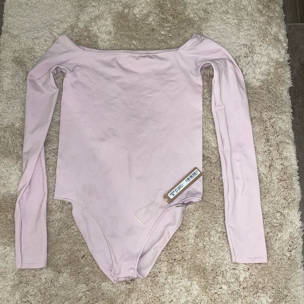 Skims off the shoulder bodysuit